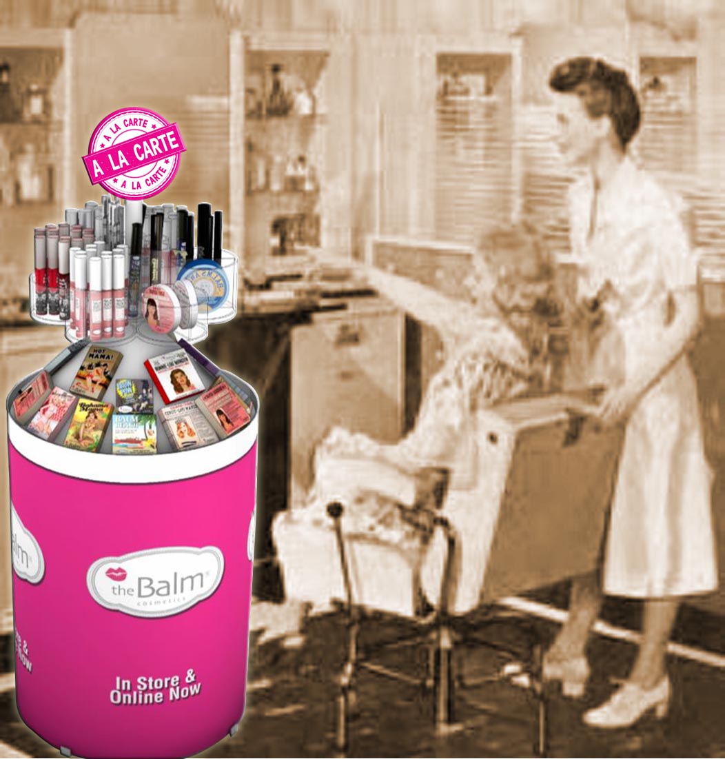 A LA CARTE , written text on pink round rubber stamp.