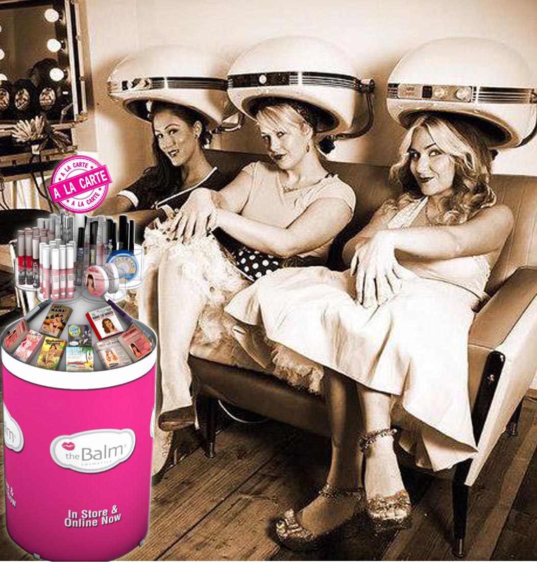 A LA CARTE , written text on pink round rubber stamp.